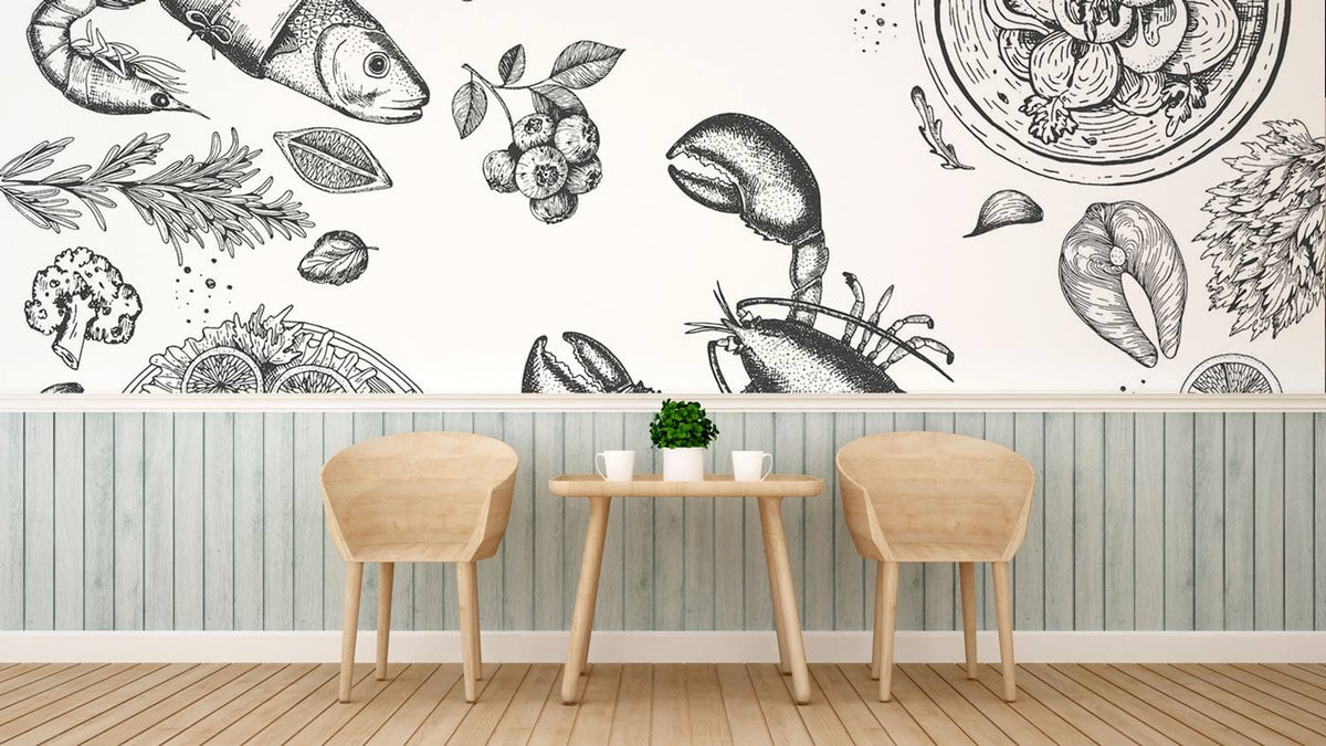 Monochrome vintage seafood wallpaper in kitchen with wooden chairs, slatted wall, and light wood flooring.
