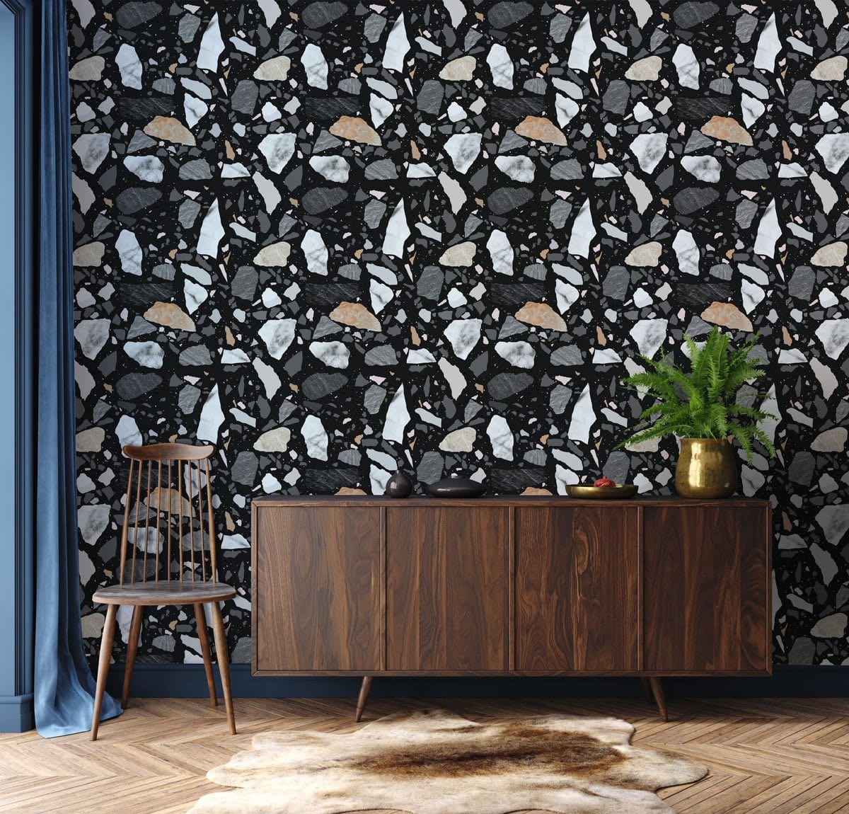 Contemporary Black and White Terrazzo Wallpaper, wooden sideboard, blue wall, retro chair, herringbone flooring.