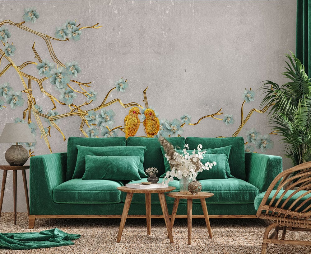 Exquisite grey floral bird branch wallpaper in living room with gold accents, green sofa, and rattan chair.