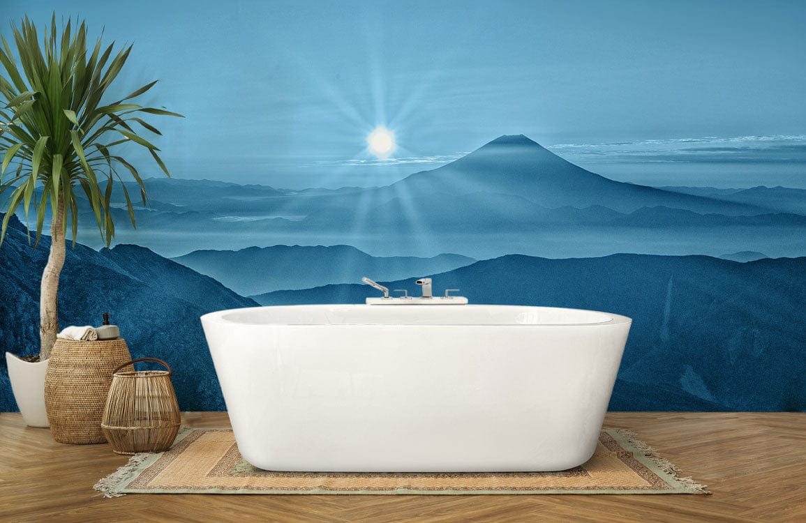 Serene Blue Mountain mural wallpaper in a contemporary bathroom with white bathtub and wood flooring.