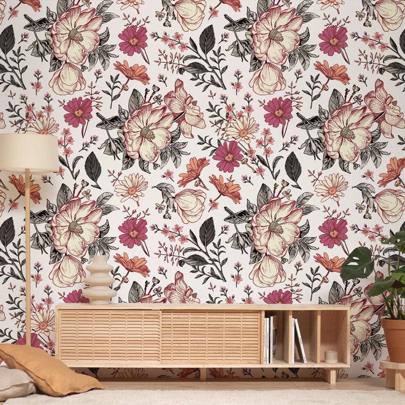 Vintage floral wallpaper in room with cream sofa, wooden console, colourful pattern, elegant design.