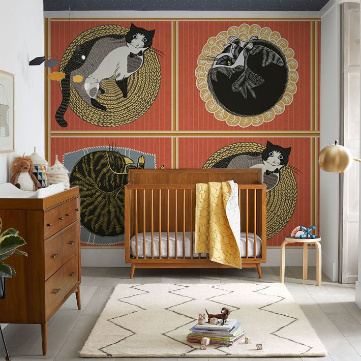 Vintage Cat Elegance mural in nursery, featuring Art Deco style, wooden crib, chest of drawers.