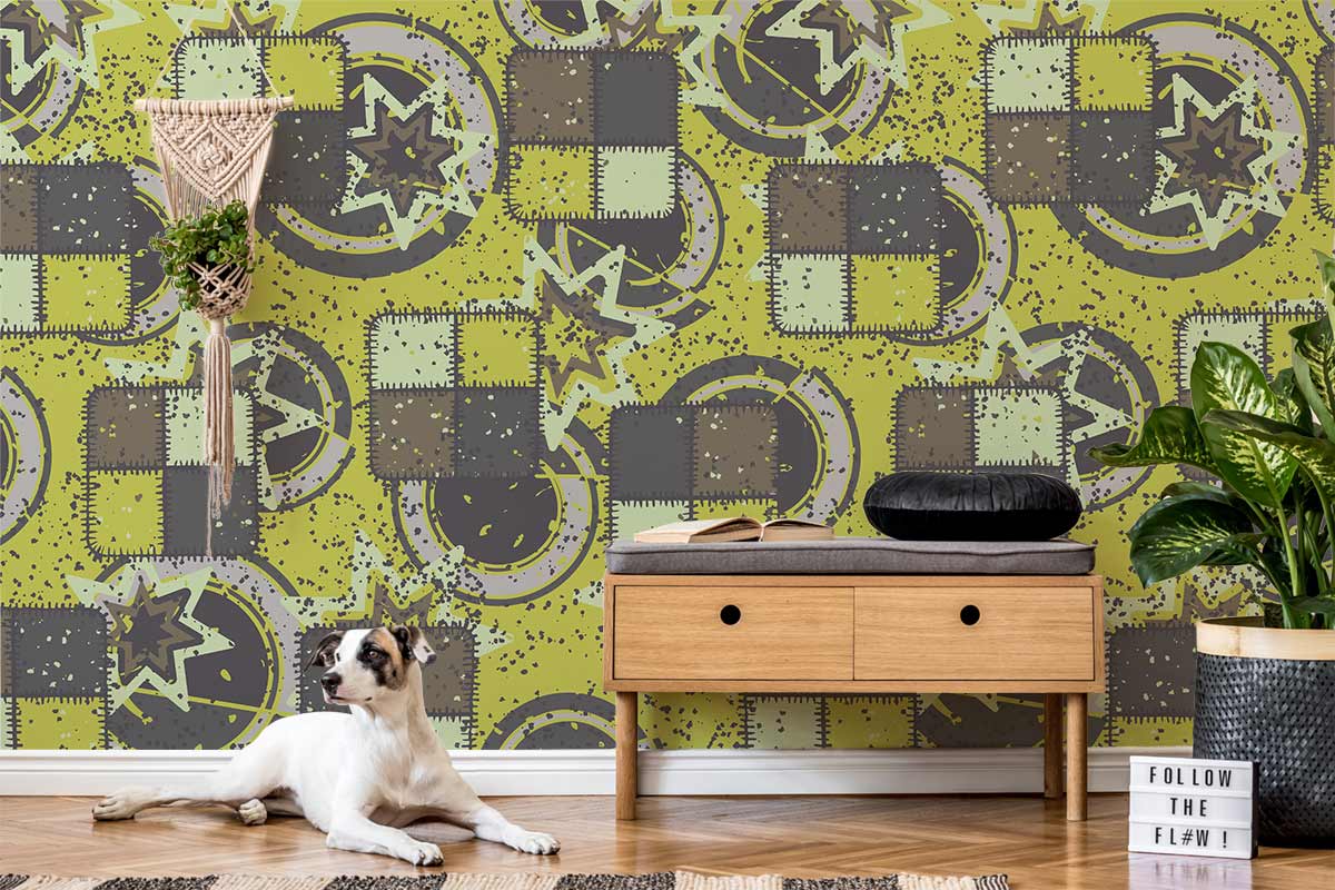Contemporary abstract wallpaper in olive green and charcoal, wooden console, dog, and modern decor.
