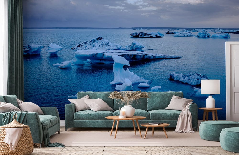 Arctic Iceberg Blue Serenity wallpaper in modern living room with teal sofas and light wooden flooring.