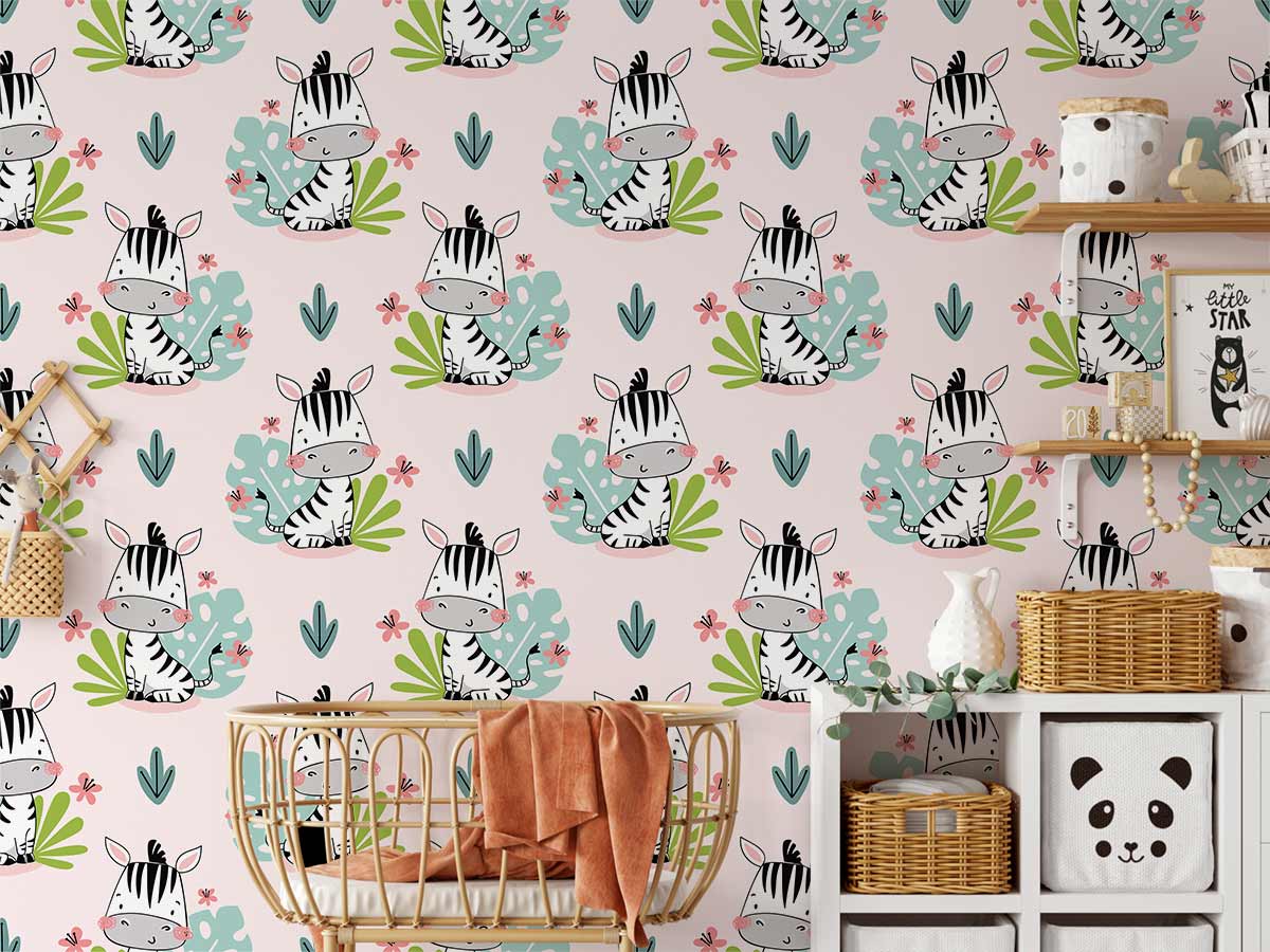 Playful zebra nursery wallpaper, pastel pink and green; wicker crib, rattan baskets, nursery decor.
