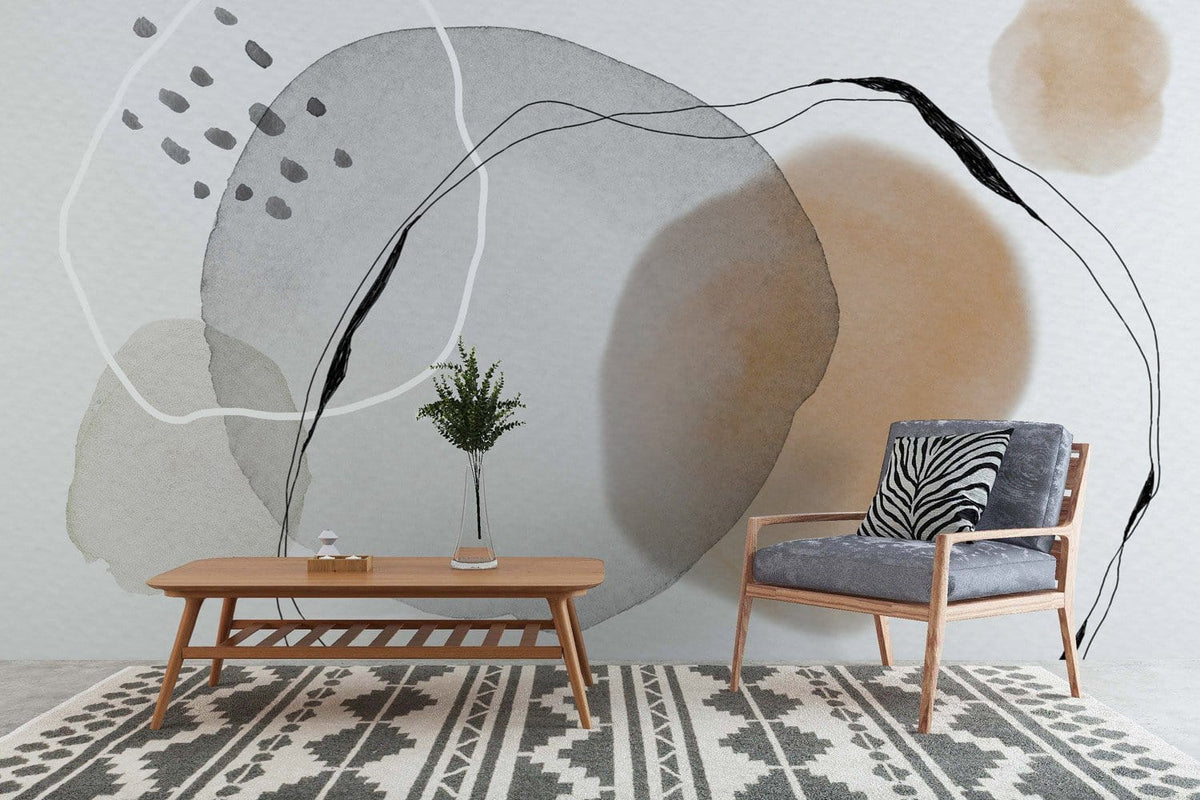 Abstract neutral tones watercolour wallpaper in modern lounge with grey chair, wooden table, patterned rug.