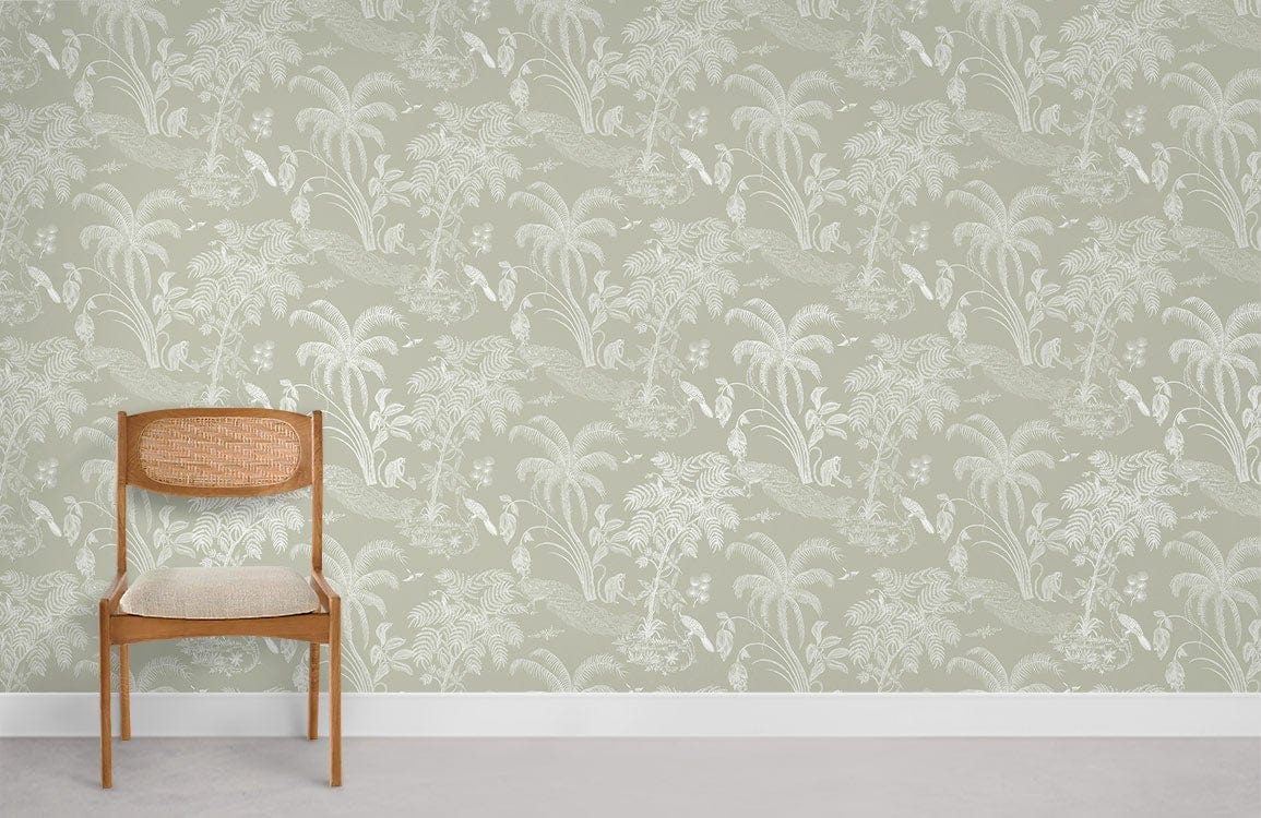 Elegant sage green tropical jungle wallpaper in a sophisticated interior with wooden chair and grey flooring.