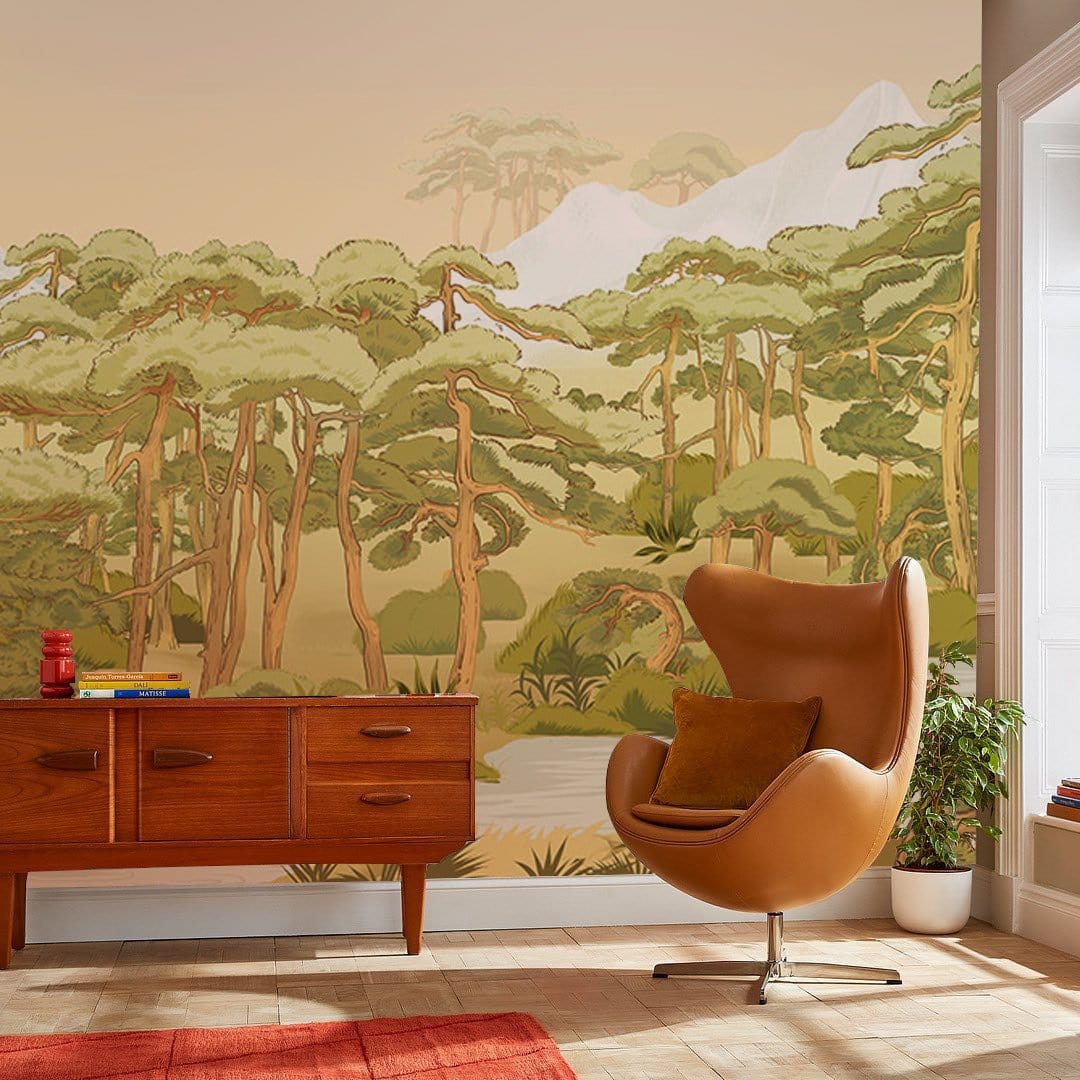 Tranquil forest mural wallpaper with river, mid-century sideboard, cosy chair in stylish living room.