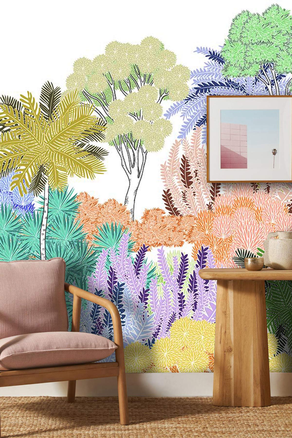 Colourful Pastel Tropical Jungle Mural Wallpaper in living room with beige sofa and wooden table.