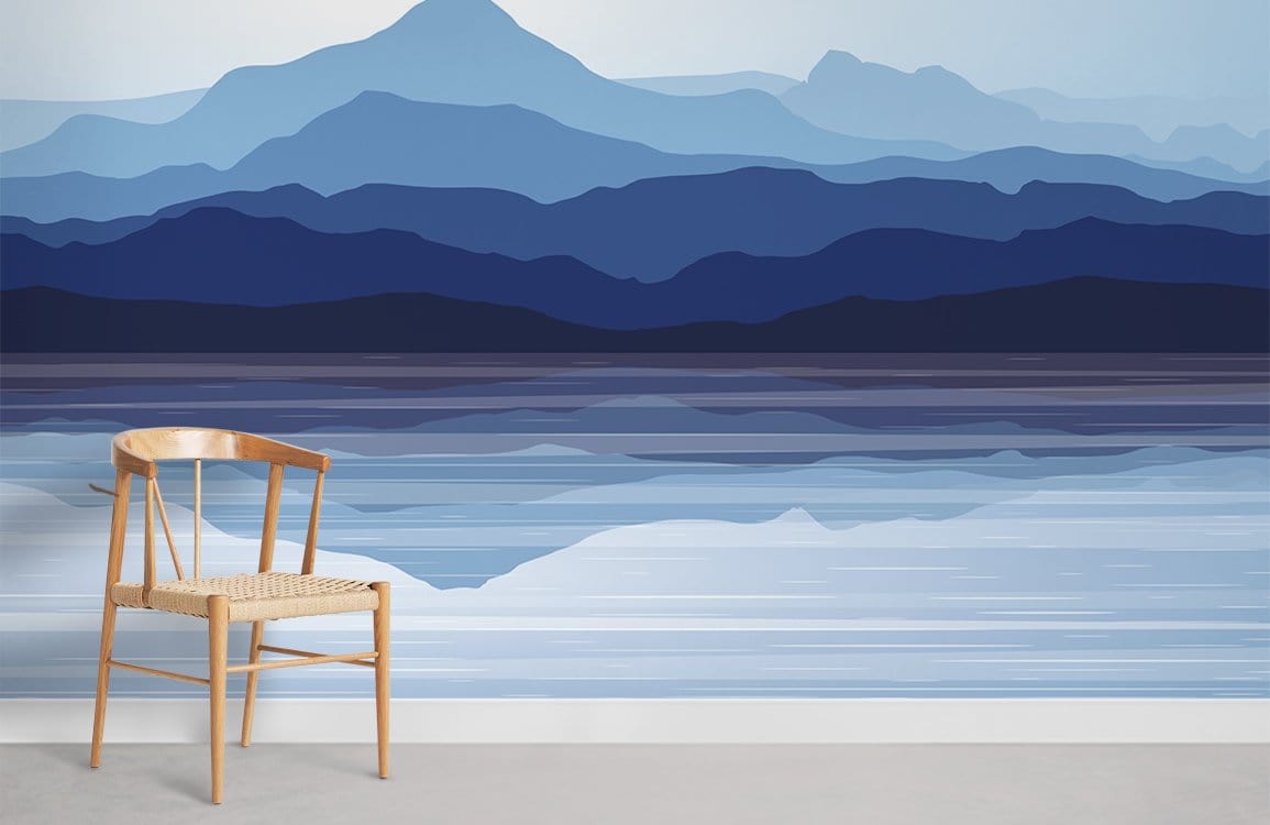 Serene Blue Mountain Landscape Mural Wallpaper in minimalist room setting with wooden chair on grey floor.