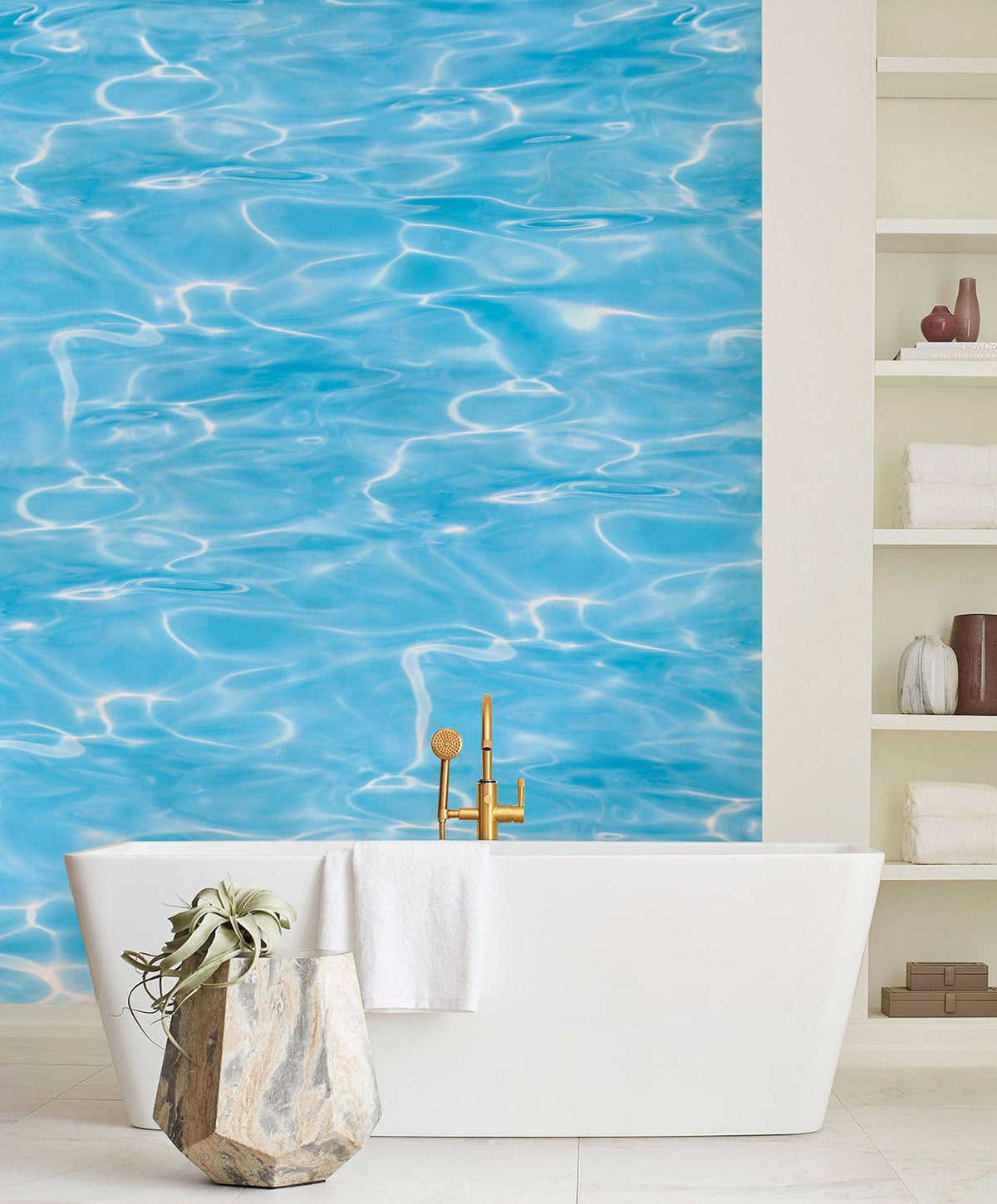 Serene Aqua Ripple Wallpaper in bathroom with white bathtub and shelving, creating a soothing effect.