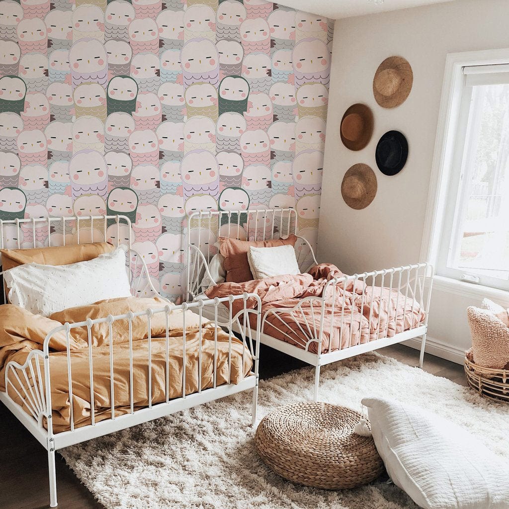 Pastel Kawaii Characters nursery wallpaper in kids' room with white beds, wooden floor, and cosy decor.