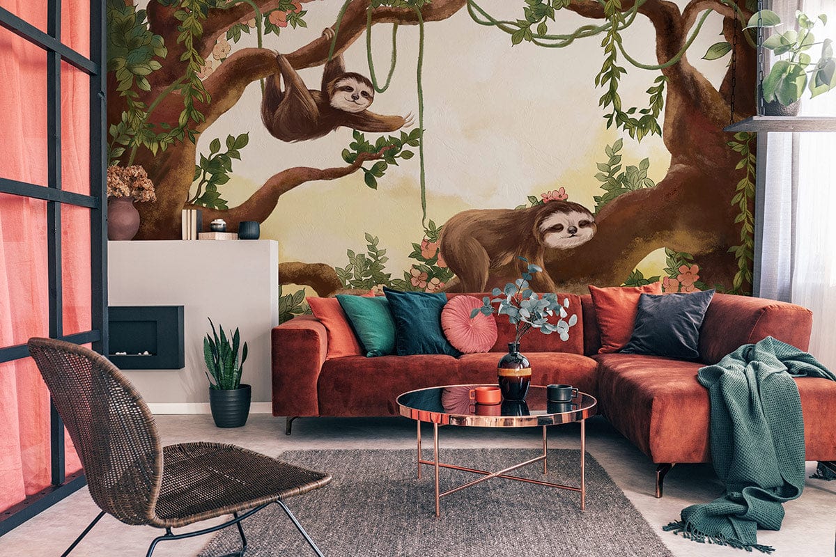 Charming Woodland Sloth mural wallpaper, earthy tones. Terracotta sofa, grey flooring, kids' room decor.