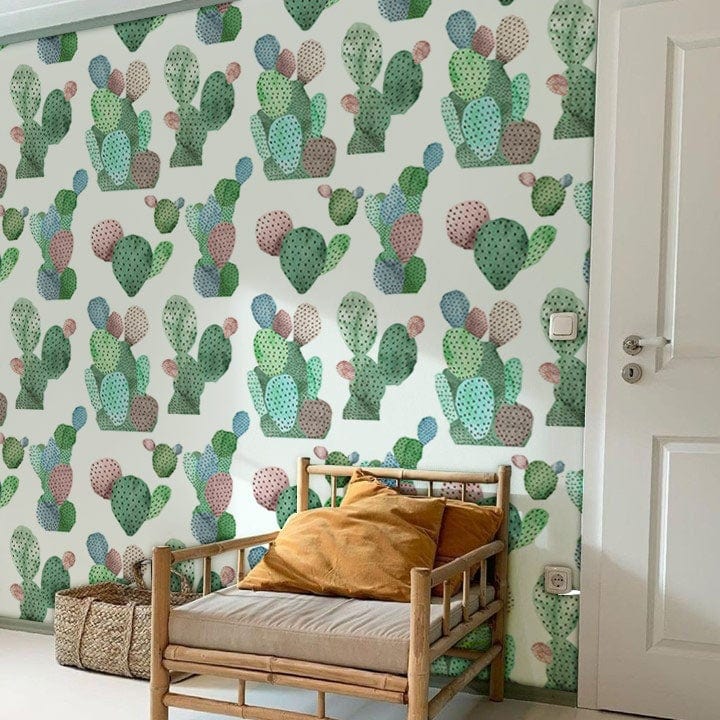 Colourful cactus garden mural wallpaper with trendy desert design, natural wood sofa, white walls.