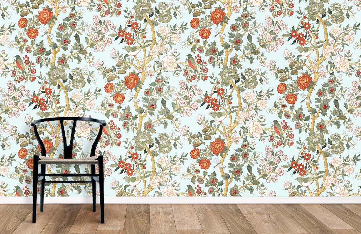 Vintage floral garden wallpaper, red green botanical pattern, wooden chair, wooden floor, bright room setting.