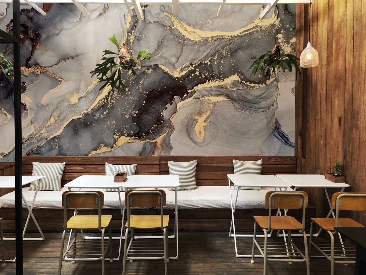 Luxury Gold and Grey Marble Effect Wallpaper in stylish cafe with wood panelling and modern furniture.