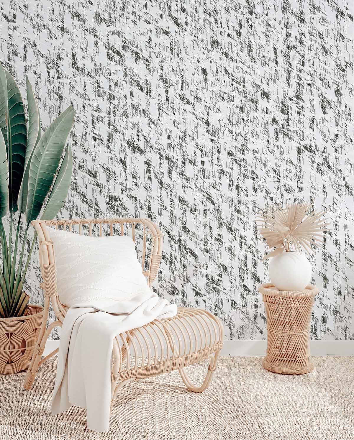 Elegant white textured wallpaper for minimalist interiors, rattan chair, neutral rug, plant, vase.