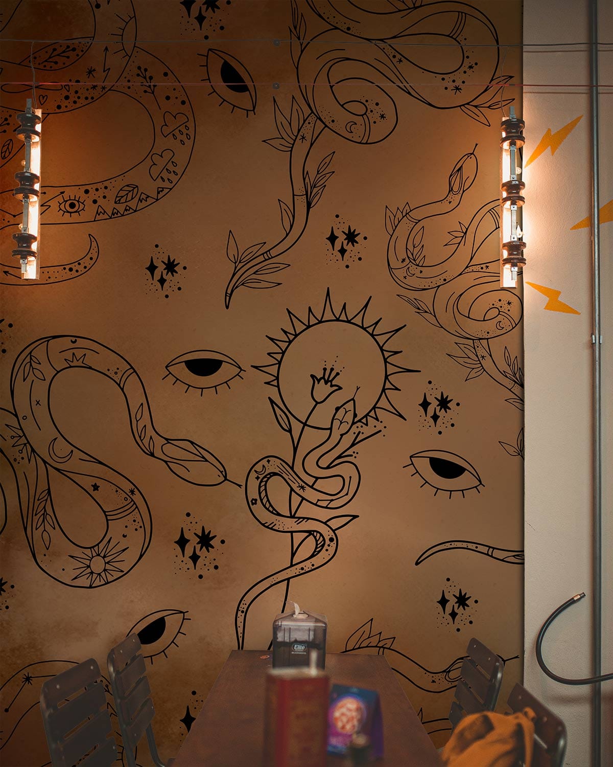 Mystical Serpent and Eye Pattern Wallpaper, industrial lights, wooden table, café setting, rustic tones.
