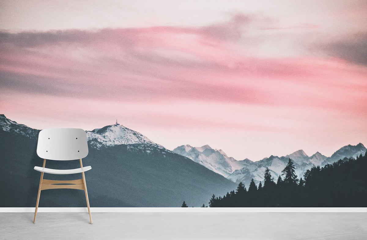 Serene Pink Dusk Mountain Landscape Mural Wallpaper, minimalist chair, light grey flooring, tranquil setting.