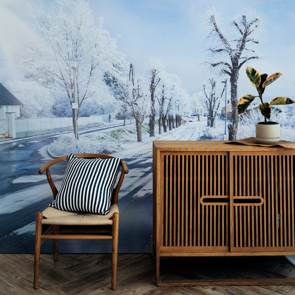 Frosty Winter Wonderland Scenic Mural Wallpaper, snowy landscape, wooden chair, sideboard, wooden flooring.