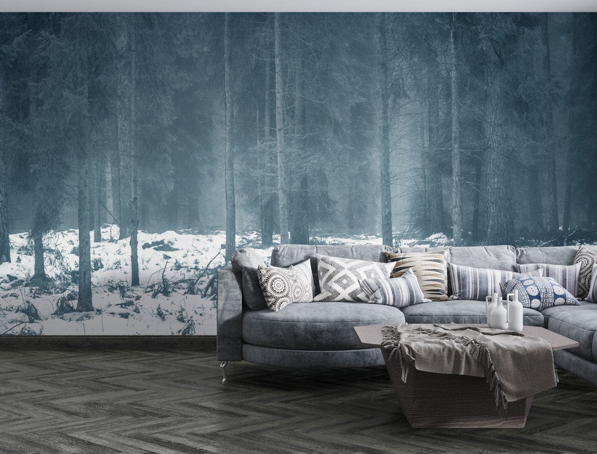 Enchanted Winter Forest mural, misty woodland wallpaper, grey L-shaped sofa, herringbone wooden flooring, lounge.
