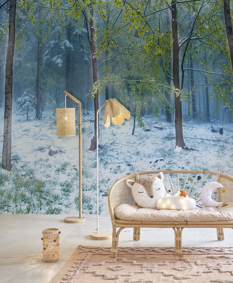 Enchanted Winter Forest Mural Wallpaper, misty landscape, beige sofa, rattan lamp, soft pink rug.