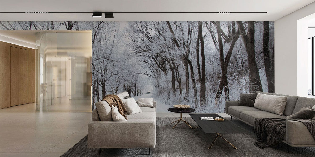 Winter Wonderland Snowy Tree Path Mural, grey sofas, modern living room, wooden flooring, glass partition.
