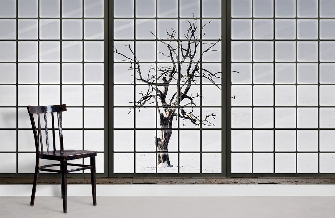 Winter Tree Black and White Mural Wallpaper, Minimalist Window View, features wooden chair, white flooring.