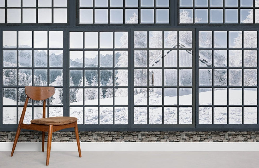 Winter Wonderland mural wallpaper with rustic window, wooden chair, and grey flooring in a modern room.