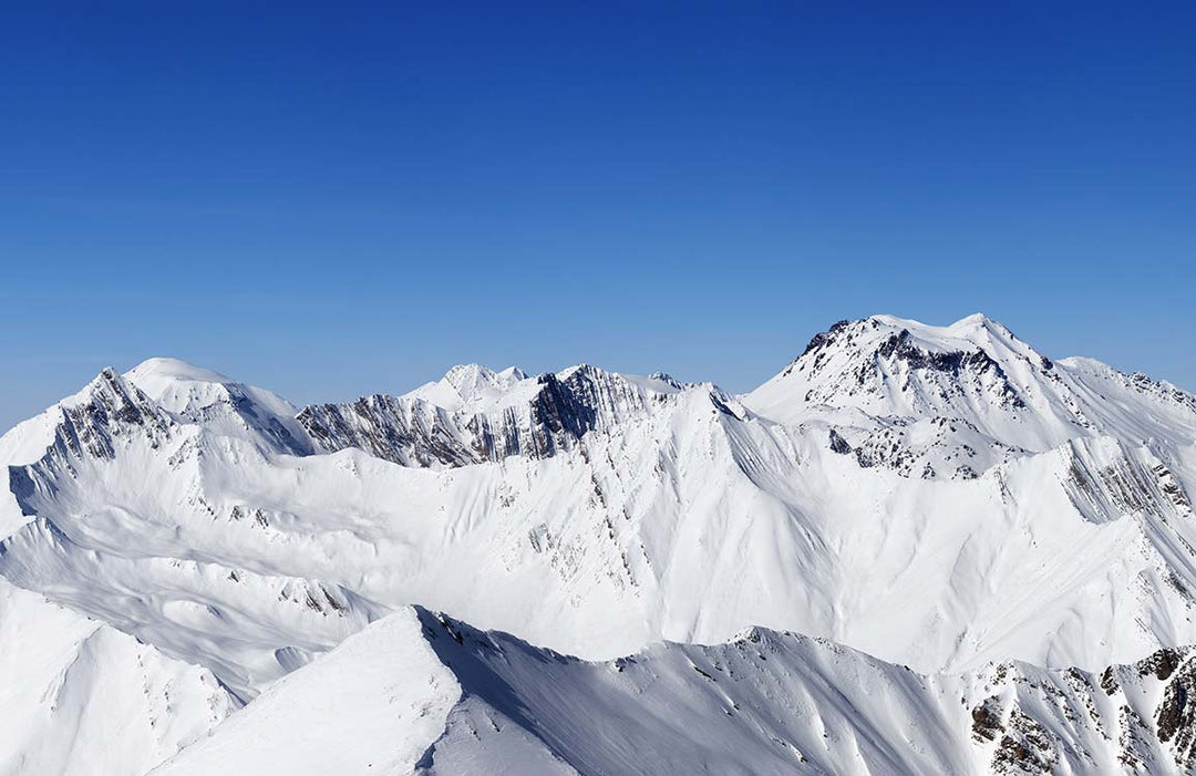 Serene Snowy Mountain Landscape Mural Wallpaper - Blue and White Vista