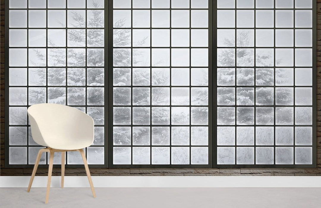 White chair with Frosted Winter Window Mural Wallpaper, tranquil snowy landscape, grey floor, minimalist decor.