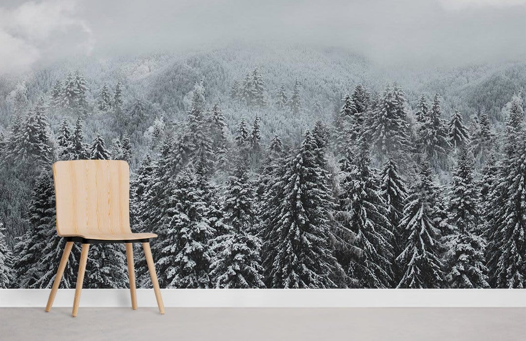 Winter Forest Mist Scenic Mural Wallpaper in grey, featuring minimalist wooden chair, concrete flooring.