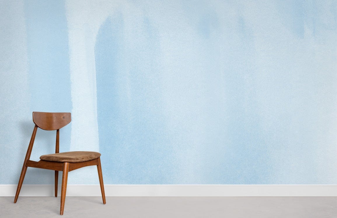 Sky blue watercolour effect wallpaper, wooden chair, minimalist decor, serene interior, light grey flooring.