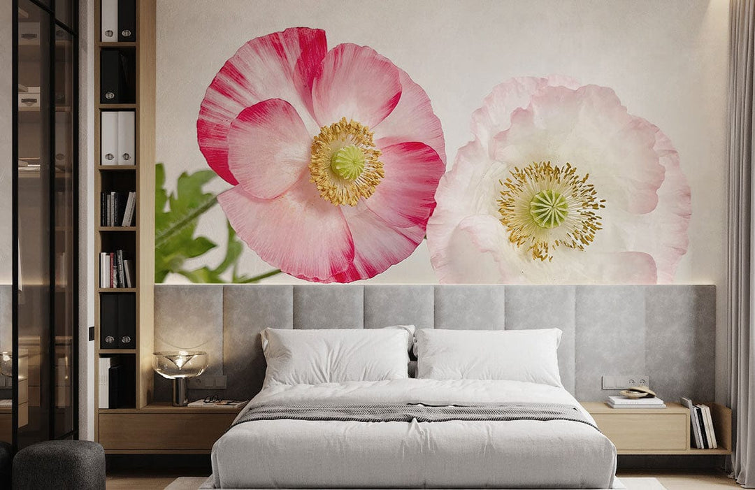 Romantic floral mural wallpaper in bedroom, grey upholstered headboard, modern bedside table, luxurious bedding.