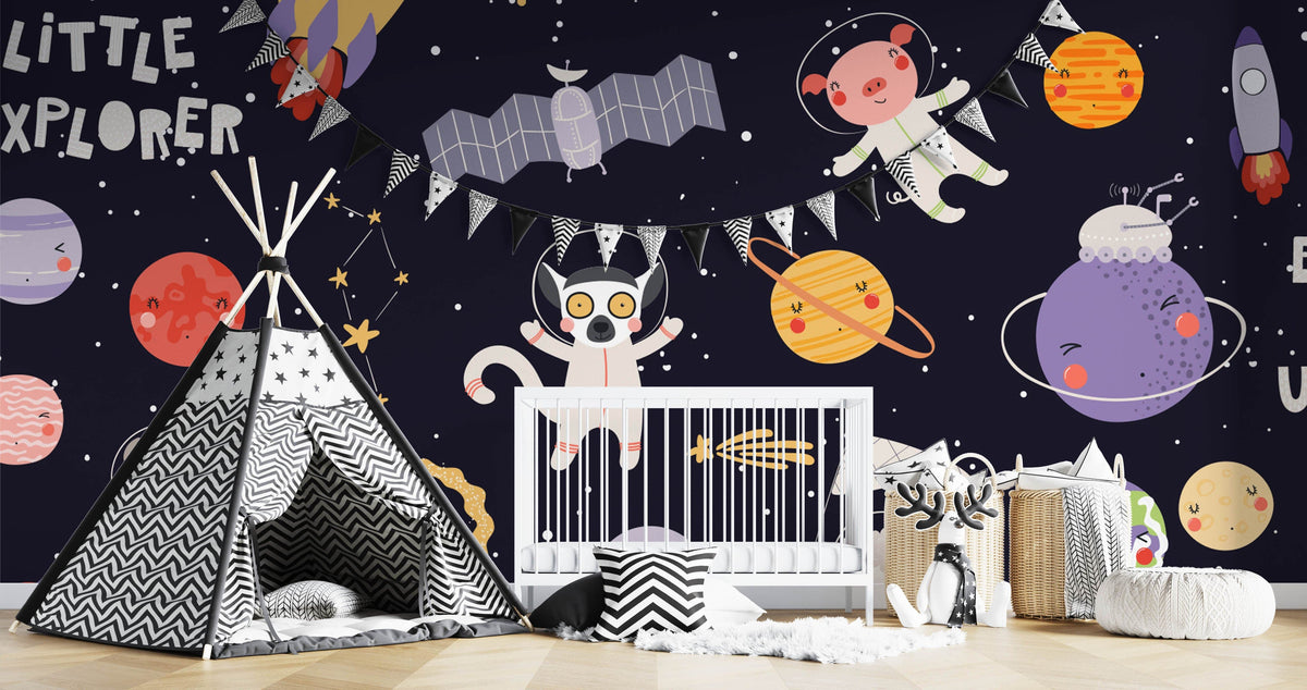 Children's room with Cosmic Adventure mural wallpaper, chevron tent, white cot, light wood flooring.