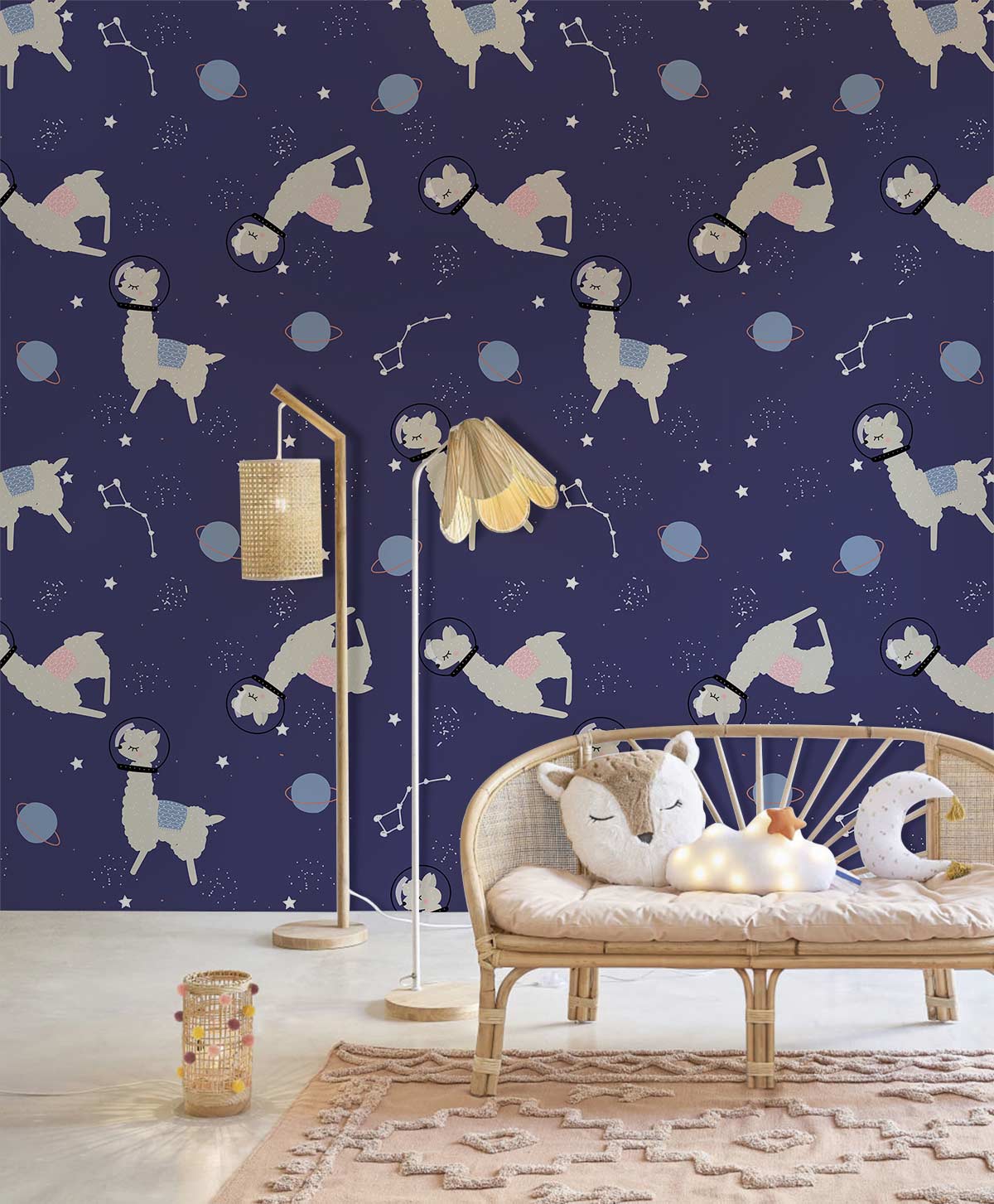Charming Space Llama Kids' Wallpaper in dark blue; features rattan sofa, pastel rug, and floor lamp.