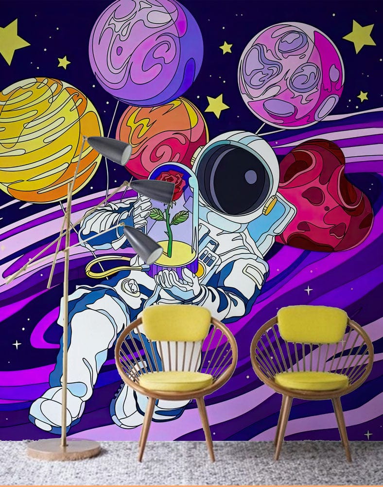 Cosmic Astronaut Galaxy Mural Wallpaper with yellow chairs, colourful planets, and modern Décor in vibrant room.
