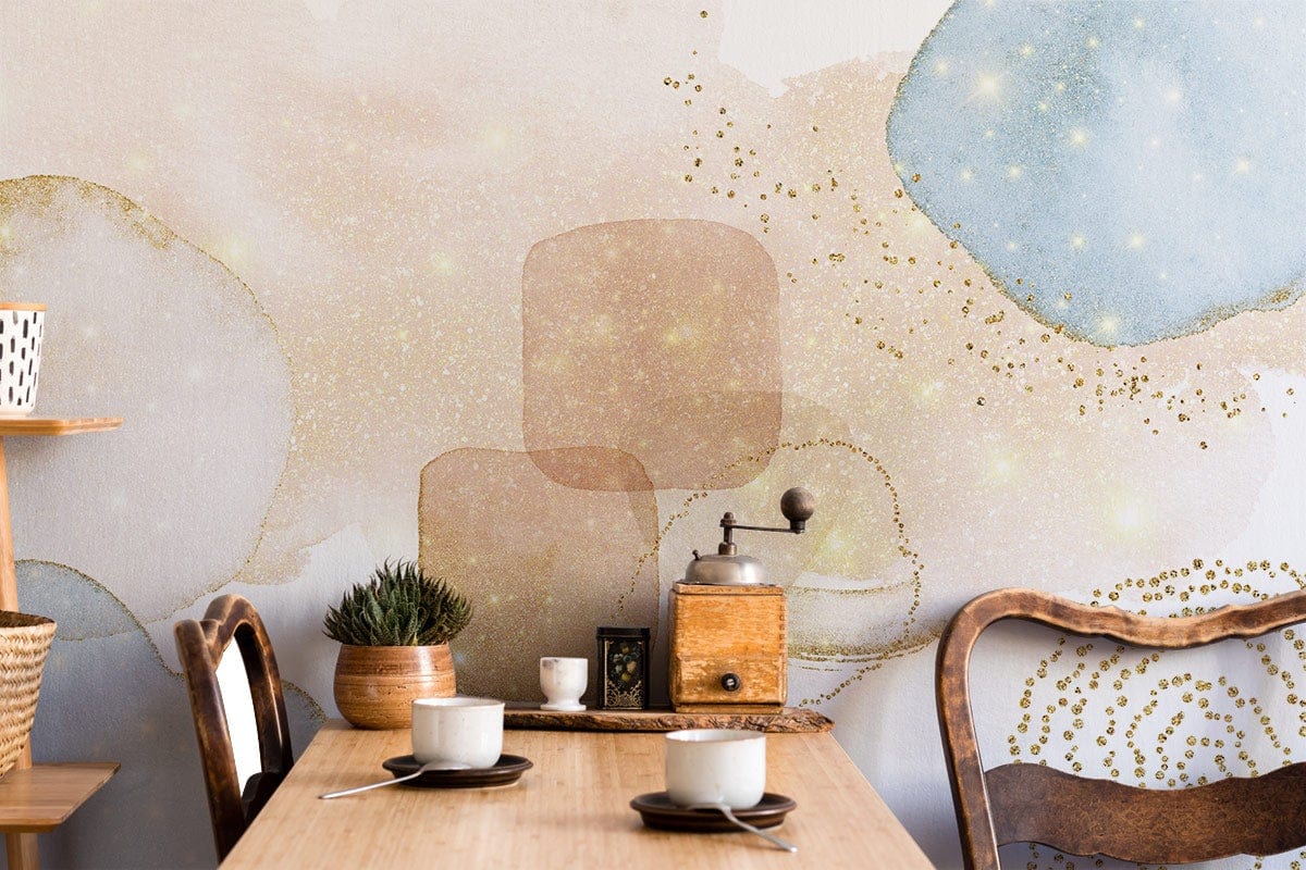 Elegant Pastel Abstract Mural Wallpaper with Gold Glitter in dining room featuring wooden chairs and table.
