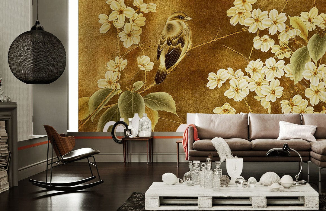 Vintage floral bird mural wallpaper in golden tones, elegant living room setting, dark wood flooring.