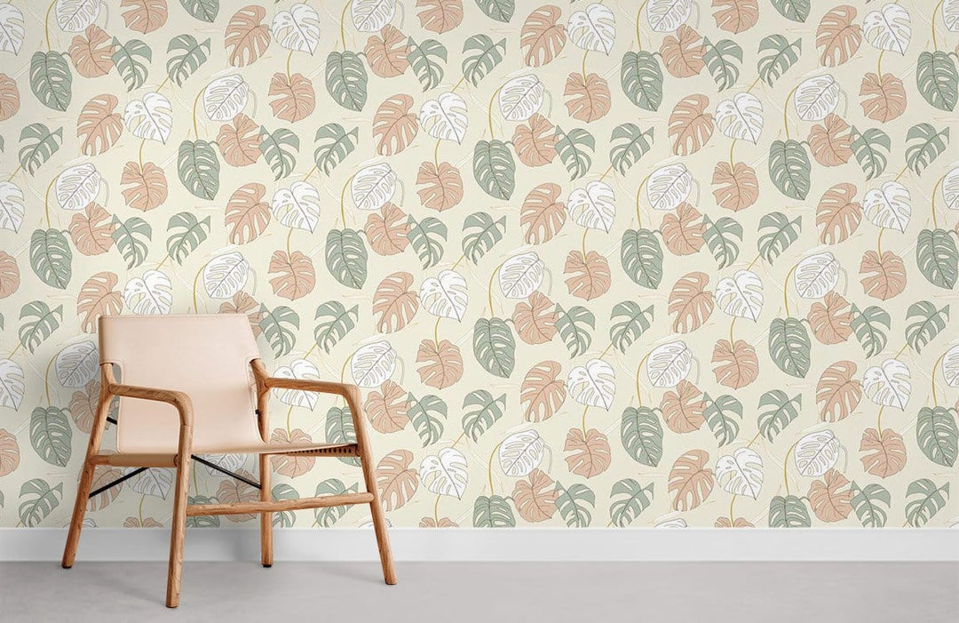 Tropical leaf wallpaper in pastel tones, beige chair, light floor, accent wall in modern room.