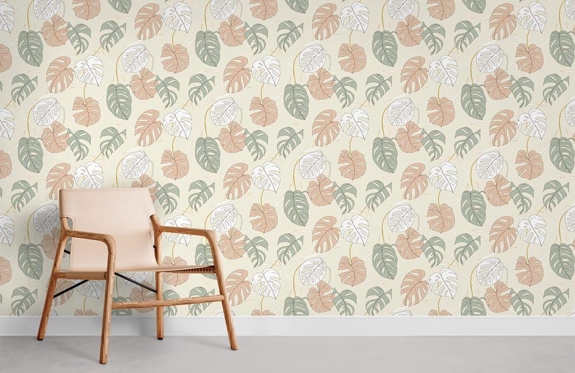 Tropical leaf wallpaper in pastel tones, beige chair, light floor, accent wall in modern room.