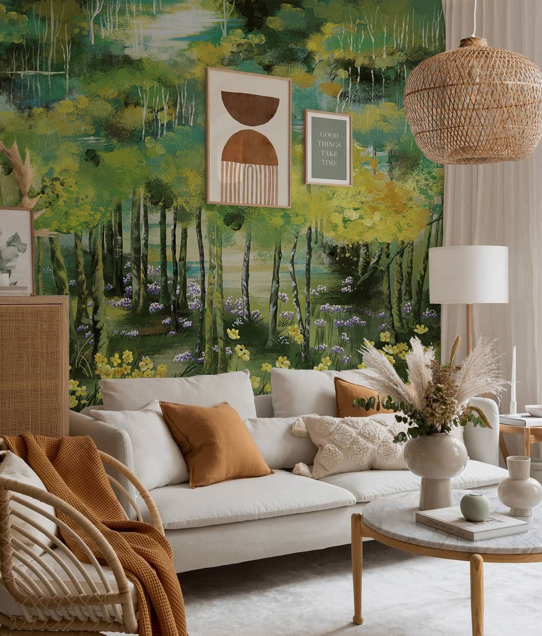 Enchanted Green Forest Mural wallpaper in cosy living room with beige sofa, rattan chair, and decor.