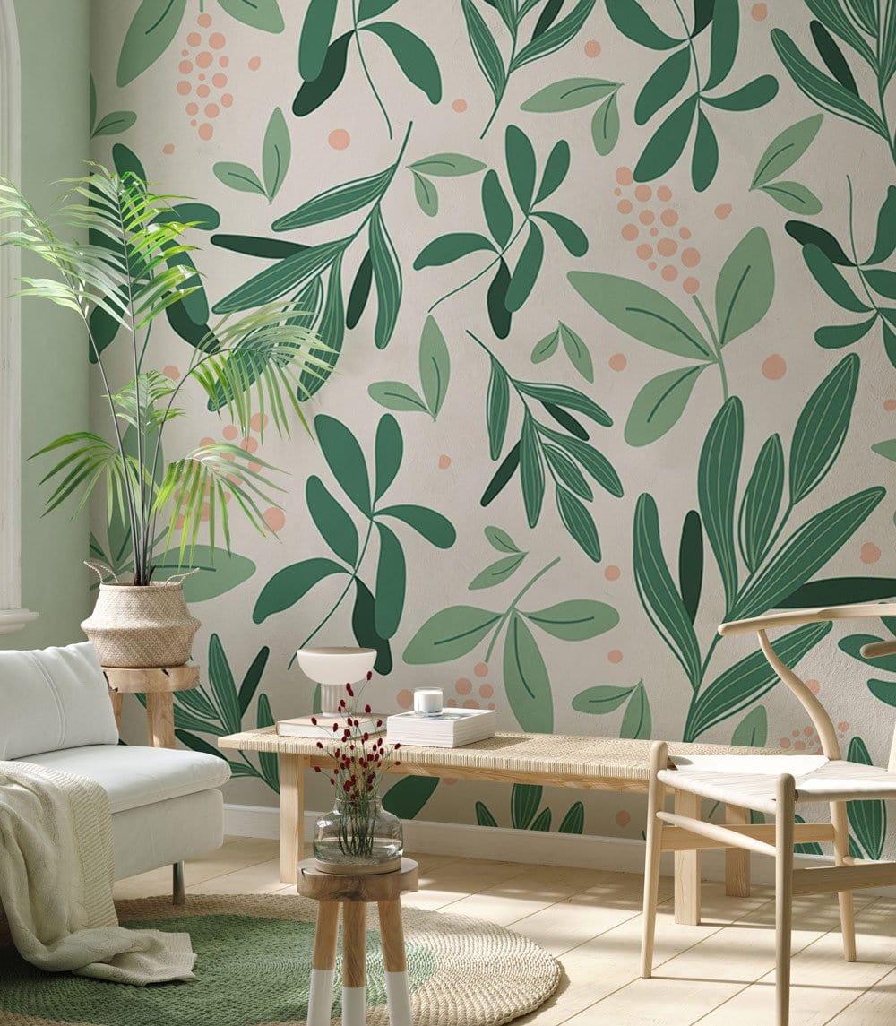Organic green botanical leaf wallpaper in modern living room with neutral sofa and wooden flooring.