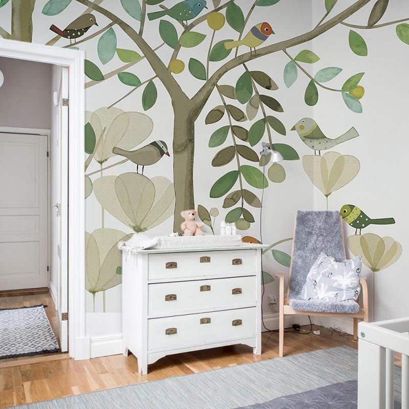 Whimsical woodland birds wallpaper, soft earthy tones; white dresser, wooden flooring, modern chair, hallway.
