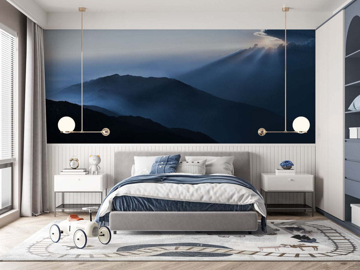 Serene Blue Mountain Sunrise Panoramic Mural Wallpaper in bedroom with grey bed, modern pendant lights.