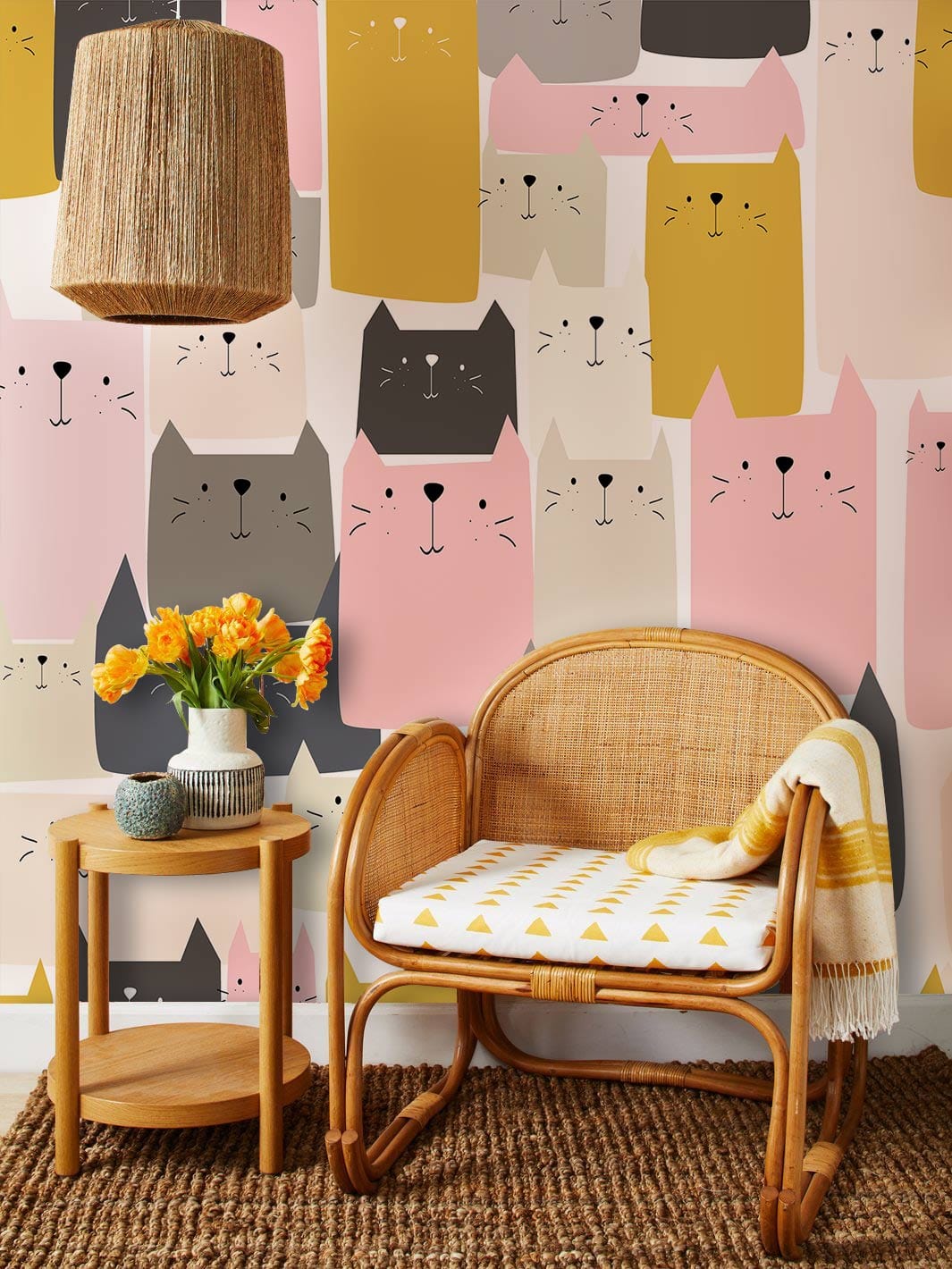 Whimsical multicoloured cats wallpaper with rattan chair, wooden table, woven rug in cosy room.