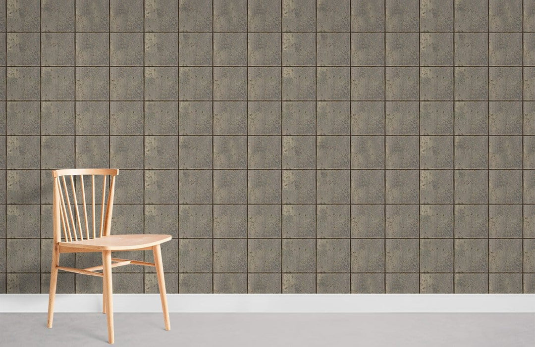 Vintage grid pattern olive stone effect wallpaper in modern room with wooden chair and light flooring.