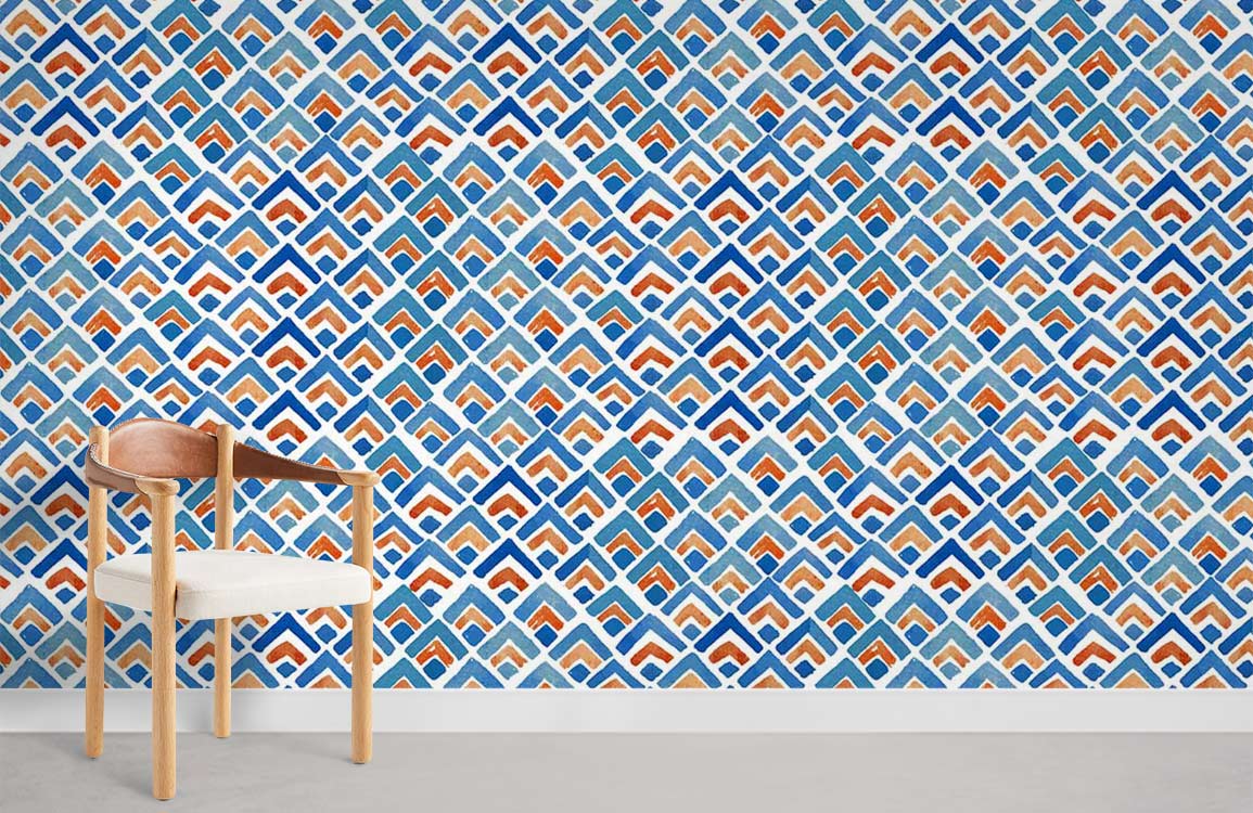 Blue and orange geometric wallpaper, modern design, with wooden chair on grey carpeted floor.