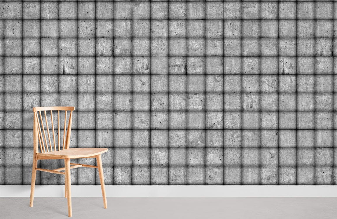 Grey industrial concrete grid pattern wallpaper with wooden chair, modern textured style decor.