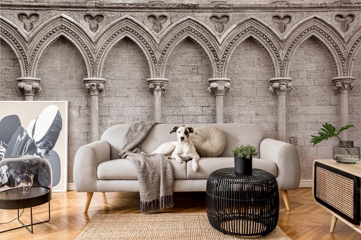 Vintage Gothic Archway mural wallpaper, sepia stone, neutral sofa, parquet flooring, living room decor.